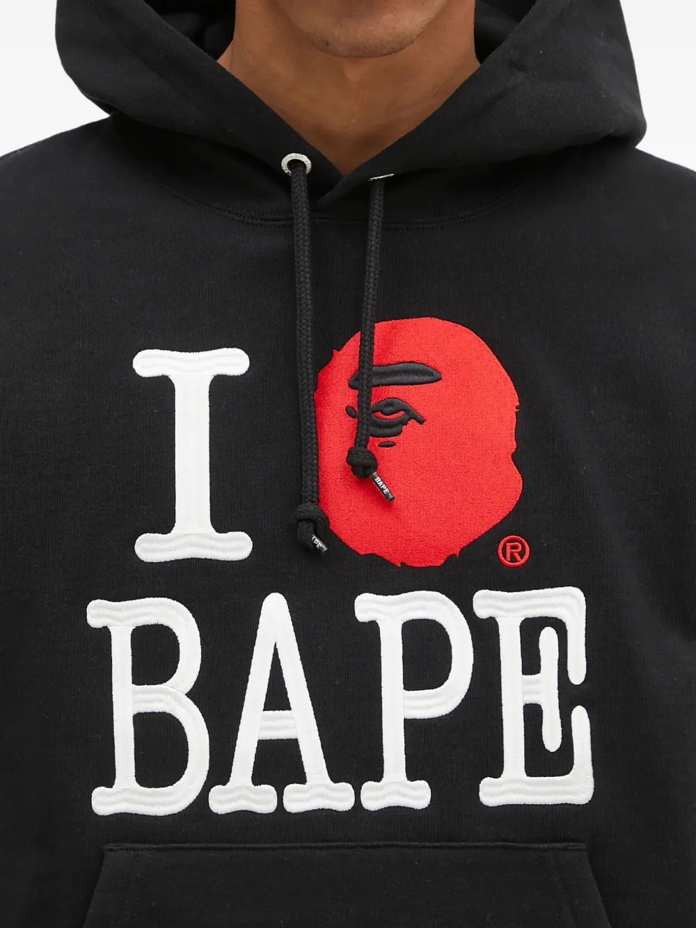 Close-up of BAPE zipper and stitching details